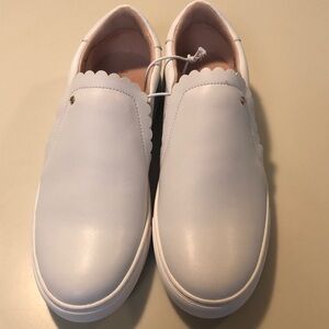 Kate Spade White slip on loafers.  New